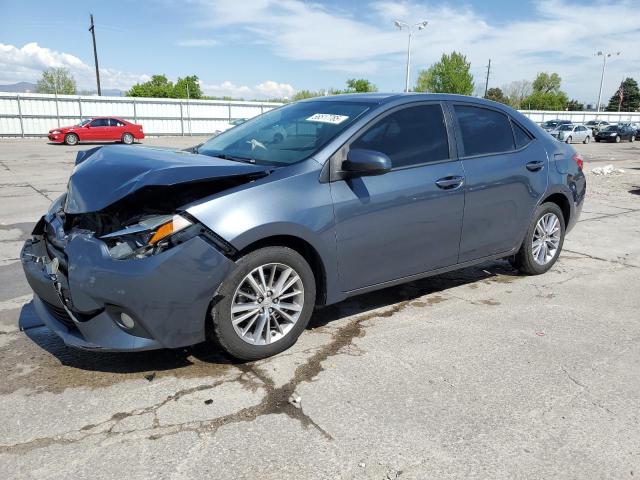 TOYOTA COROLLA L 2014 with VIN 5YFBURHE5EP129060 - Photo from auction