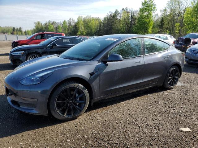 TESLA MODEL 3 2023 with VIN 5YJ3E1EAXPF404814 - Photo from auction