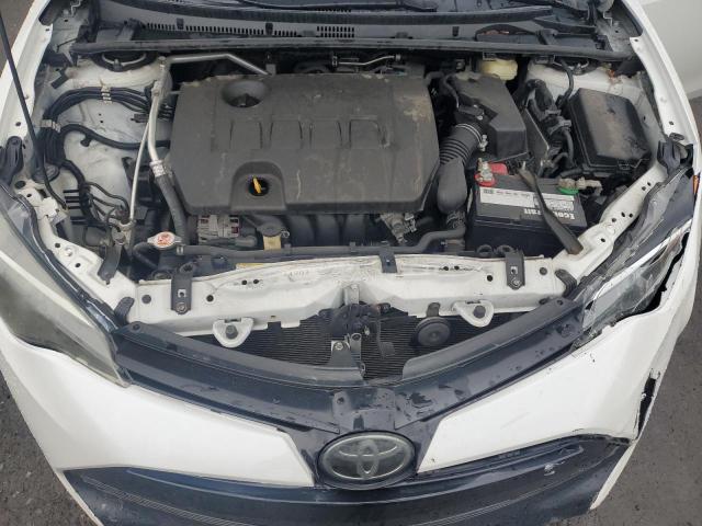 Photo 11 from auction – 2018 TOYOTA COROLLA L with VIN 5YFBURHE6JP820270