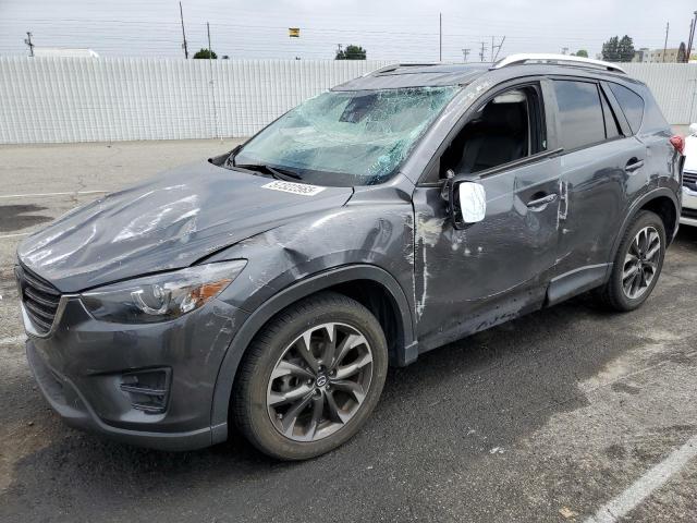 MAZDA CX-5 GT 2016 with VIN JM3KE2DY3G0792619 - Photo from auction