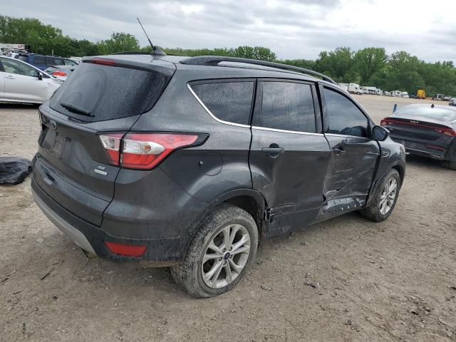 Photo 3 from auction – 2018 FORD ESCAPE SE with VIN 1FMCU0GD4JUC03165