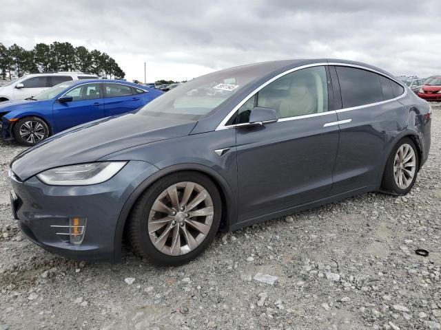 TESLA MODEL X 2017 with VIN 5YJXCBE20HF044623 - Photo from auction