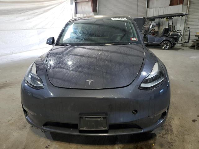 Photo 5 from auction – 2023 TESLA MODEL Y with VIN 7SAYGDEE6PF894479