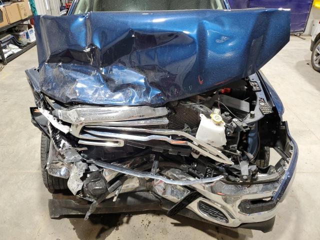Photo 11 from auction – 2021 RAM 1500 with VIN 1C6SRFRT9MN665526
