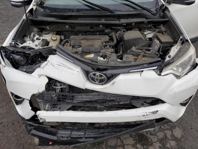 Photo 12 from auction – 2017 TOYOTA RAV4 XLE with VIN JTMRFREV8HJ706508