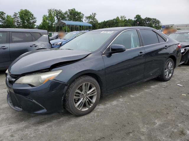 TOYOTA CAMRY LE 2017 with VIN 4T1BF1FKXHU299227 - Photo from auction