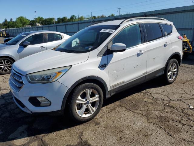 FORD ESCAPE SE 2017 with VIN 1FMCU9GD2HUA57055 - Photo from auction