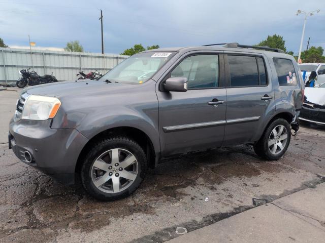 HONDA PILOT TOUR 2014 with VIN 5FNYF4H97EB041262 - Photo from auction