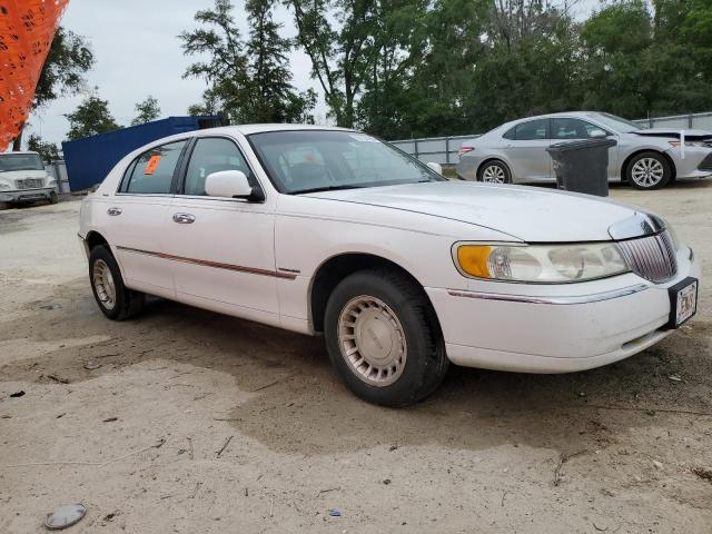 Photo 4 from auction – 2002 LINCOLN TOWN CAR E with VIN 1LNHM81W62Y650606
