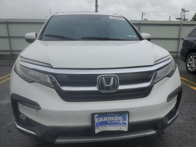 Photo 5 from auction – 2021 HONDA PILOT ELIT with VIN 5FNYF6H06MB023850