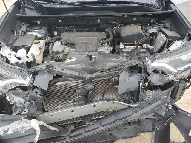 Photo 12 from auction – 2018 TOYOTA RAV4 LE with VIN 2T3ZFREV9JW449107
