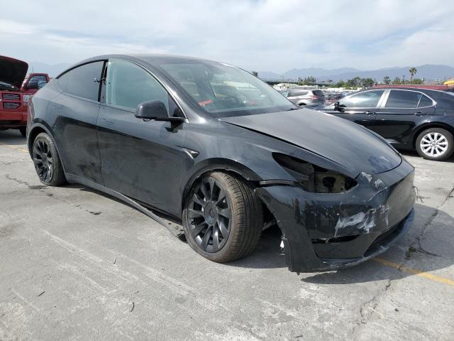 Photo 4 from auction – 2023 TESLA MODEL Y with VIN 7SAYGAEE2PF825495