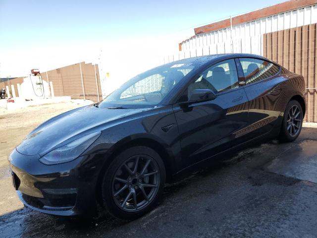 TESLA MODEL 3 2022 with VIN 5YJ3E1EA5NF288483 - Photo from auction