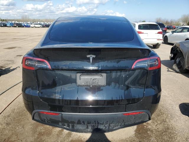 Photo 6 from auction – 2022 TESLA MODEL Y with VIN 7SAYGDEF5NF515610