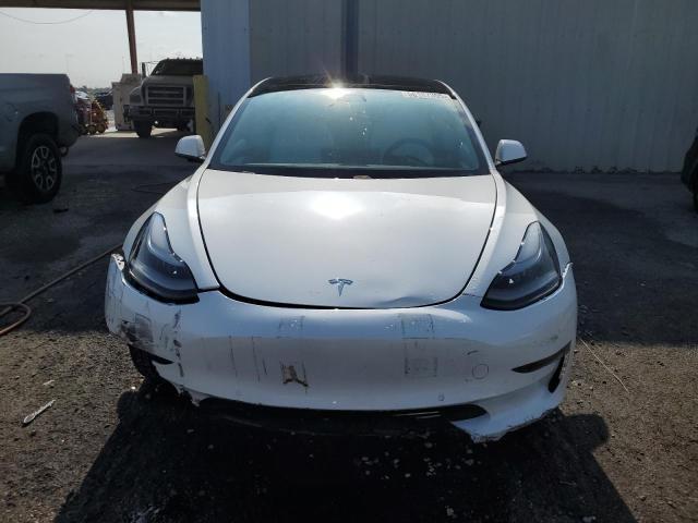 Photo 5 from auction – 2021 TESLA MODEL 3 with VIN 5YJ3E1EA2MF084092