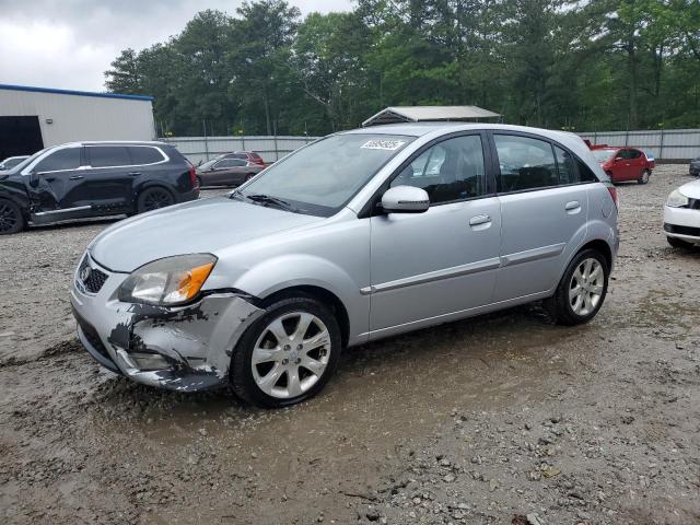 KIA RIO LX 2010 with VIN KNADH5A36A6650754 - Photo from auction