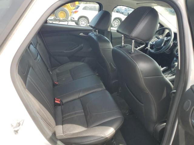 Photo 10 from auction – 2012 FORD FOCUS TITA with VIN 1FAHP3J2XCL401497