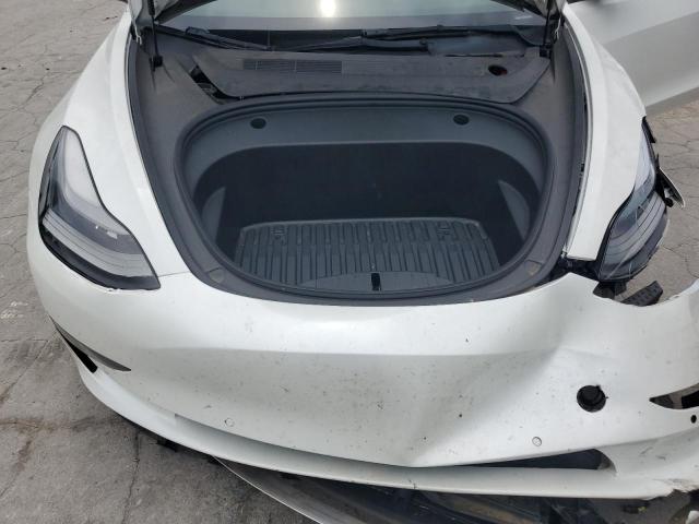 Photo 11 from auction – 2022 TESLA MODEL 3 with VIN 5YJ3E1EB9NF203489