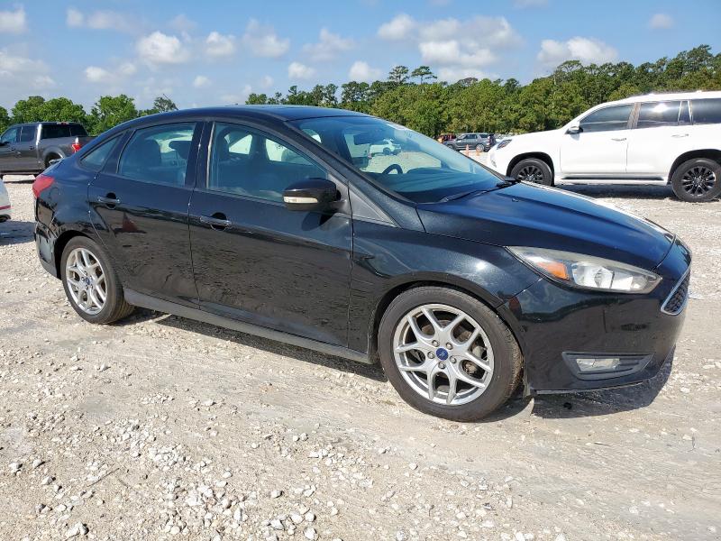 Photo 4 from auction – 2015 FORD FOCUS SE with VIN 1FADP3F20FL320066
