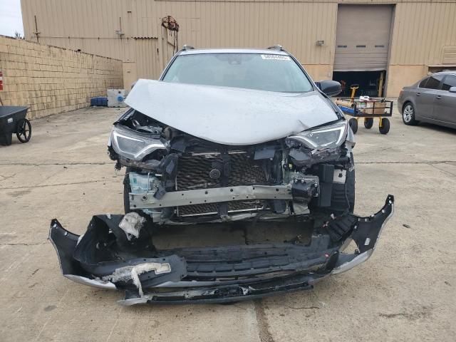 Photo 5 from auction – 2018 TOYOTA RAV4 LE with VIN 2T3ZFREV9JW449107