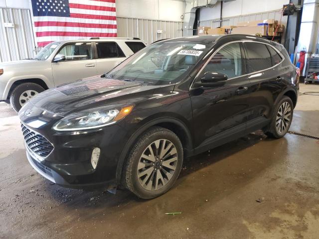 Photo 1 from auction – 2020 FORD ESCAPE TIT with VIN 1FMCU9DZ0LUC11626
