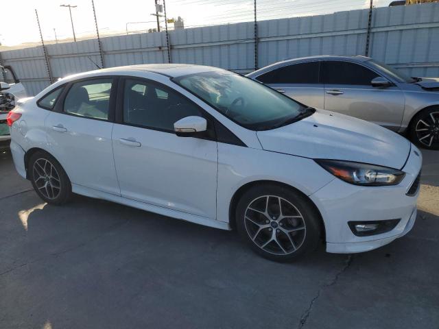 Photo 4 from auction – 2016 FORD FOCUS SE with VIN 1FADP3F26GL336032