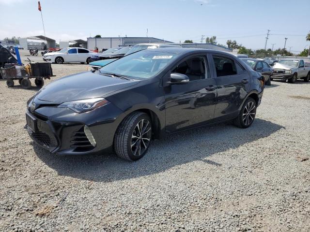 TOYOTA COROLLA L 2019 with VIN 5YFBURHE0KP871300 - Photo from auction