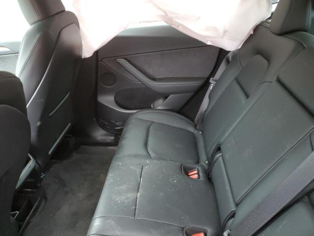Photo 11 from auction – 2023 TESLA MODEL Y with VIN 7SAYGDEE1PF830060