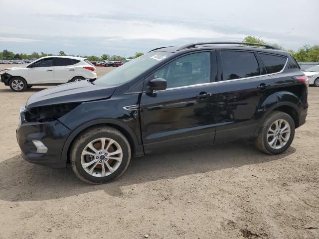 FORD ESCAPE SE 2017 with VIN 1FMCU9G92HUA05615 - Photo from auction