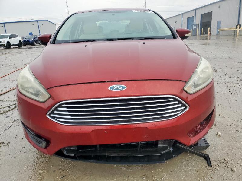 Photo 5 from auction – 2015 FORD FOCUS TITA with VIN 1FADP3J27FL334148