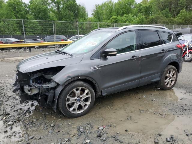 FORD ESCAPE TIT 2016 with VIN 1FMCU9JXXGUC85550 - Photo from auction