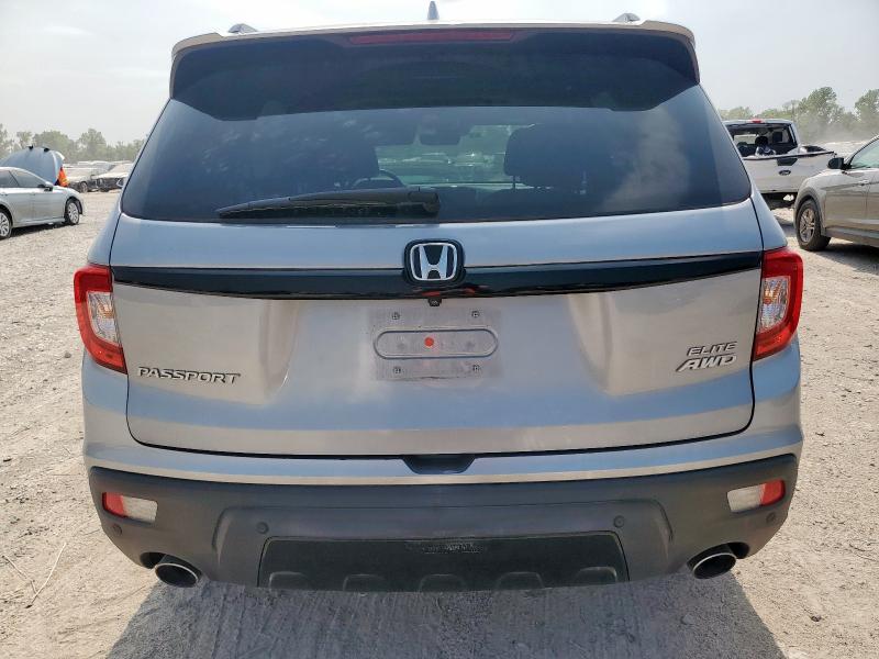 Photo 6 from auction – 2021 HONDA PASSPORT E with VIN 5FNYF8H03MB017872