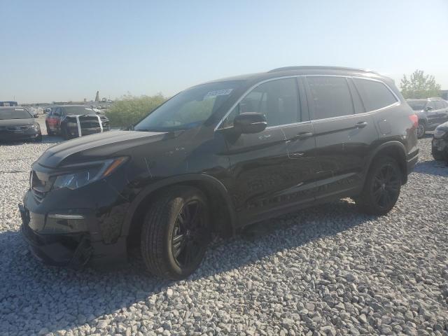 HONDA PILOT SE 2022 with VIN 5FNYF6H20NB090253 - Photo from auction