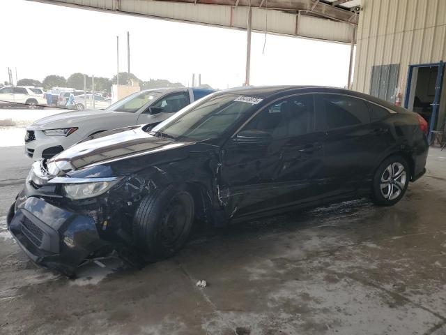 HONDA CIVIC LX 2018 with VIN 19XFC2F58JE030520 - Photo from auction