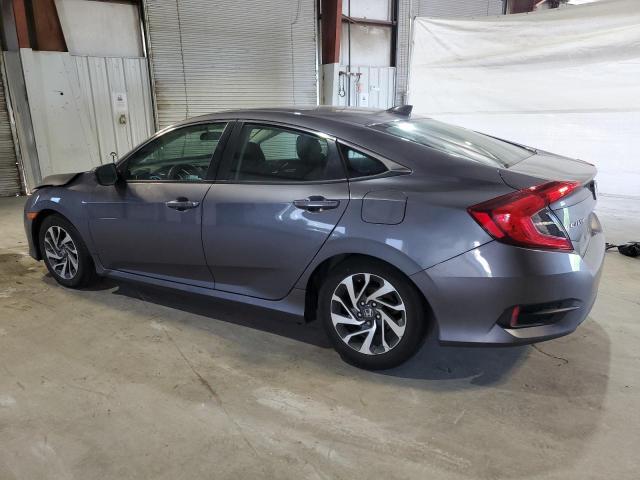 Photo 2 from auction – 2018 HONDA CIVIC EX with VIN 19XFC2F76JE041565