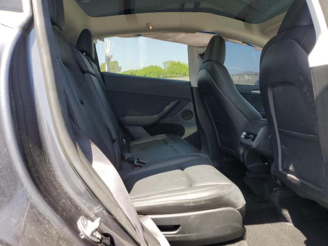Photo 11 from auction – 2023 TESLA MODEL Y with VIN 7SAYGAEEXPF847583