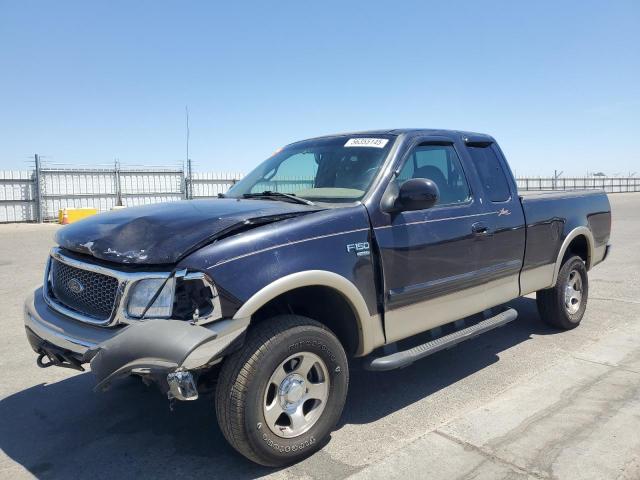 FORD F150 1999 with VIN 1FTRX18L0XKB77329 - Photo from auction