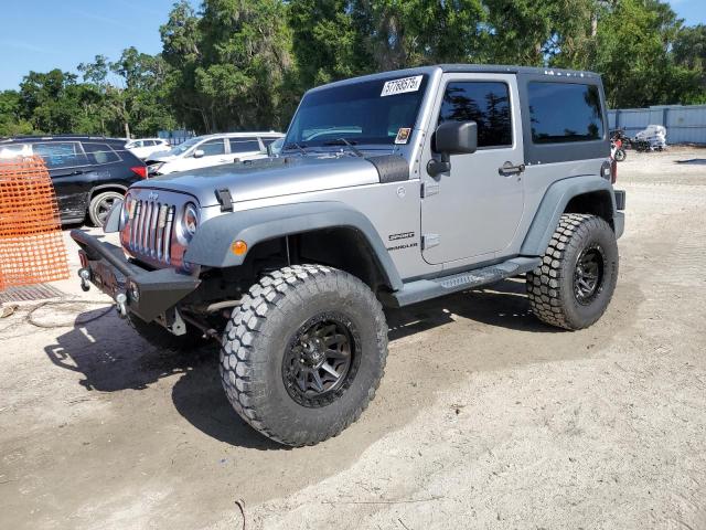JEEP WRANGLER S 2014 with VIN 1C4AJWAG0EL126249 - Photo from auction