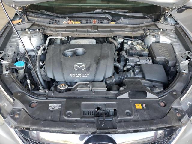 Photo 11 from auction – 2013 MAZDA CX-5 with VIN JM3KE2BE3D0150177