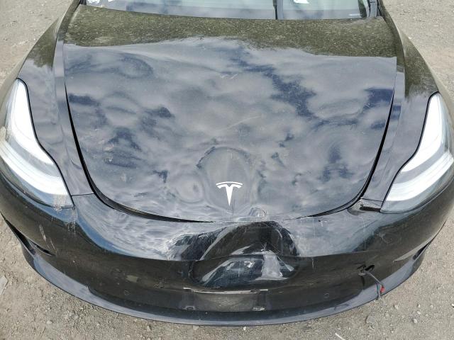 Photo 11 from auction – 2019 TESLA MODEL 3 with VIN 5YJ3E1EA7KF410711