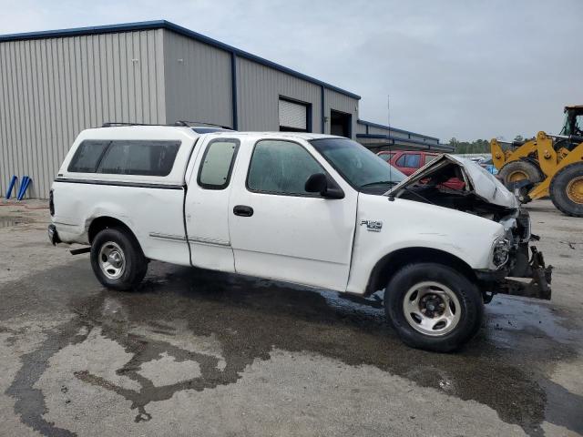 Photo 4 from auction – 2002 FORD F150 with VIN 1FTRX17W22NB18950