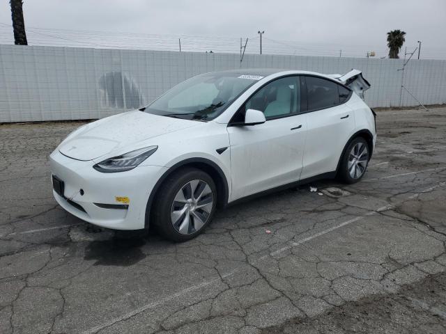 TESLA MODEL Y 2022 con VIN 7SAYGAEE0NF360454 - Foto de la subasta