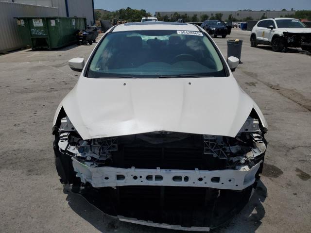 Photo 5 from auction – 2015 FORD FOCUS TITA with VIN 1FADP3J24FL304136