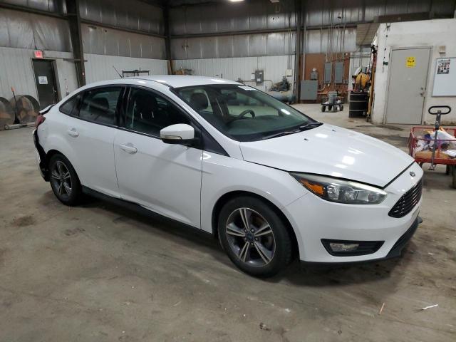 Photo 4 from auction – 2016 FORD FOCUS SE with VIN 1FADP3FE8GL324863