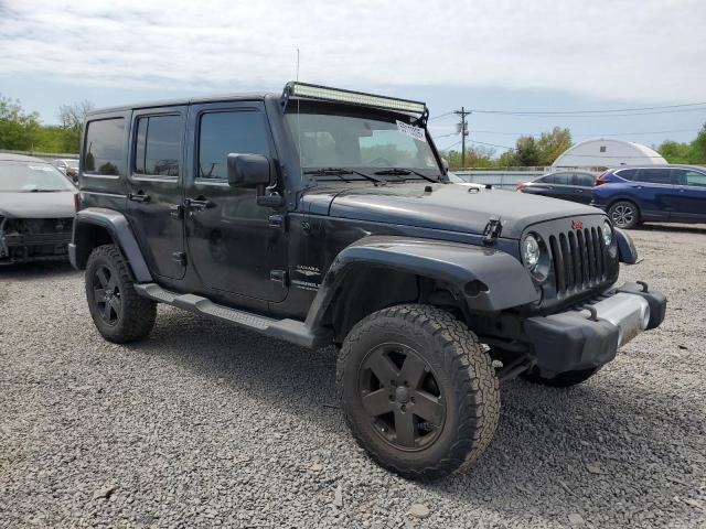 Photo 4 from auction – 2011 JEEP WRANGLER U with VIN 1J4HA5H11BL512310