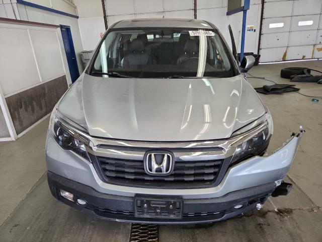 Photo 5 from auction – 2019 HONDA RIDGELINE with VIN 5FPYK3F50KB041189