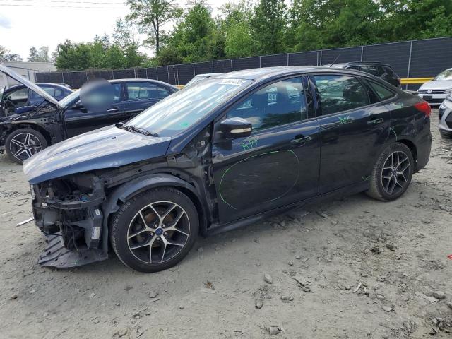 FORD FOCUS SE 2015 with VIN 1FADP3F21FL339287 - Photo from auction