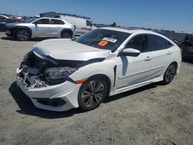 Photo 1 from auction – 2018 HONDA CIVIC EXL with VIN JHMFC1F70JX001068