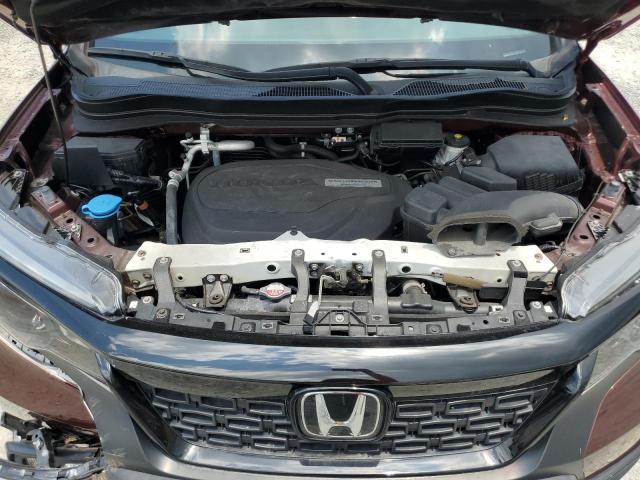 Photo 12 from auction – 2020 HONDA PASSPORT E with VIN 5FNYF7H56LB001847