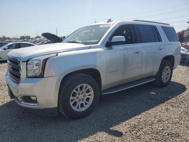 GMC YUKON SLE 2018 with VIN 1GKS2AKC7JR245153 - Photo from auction